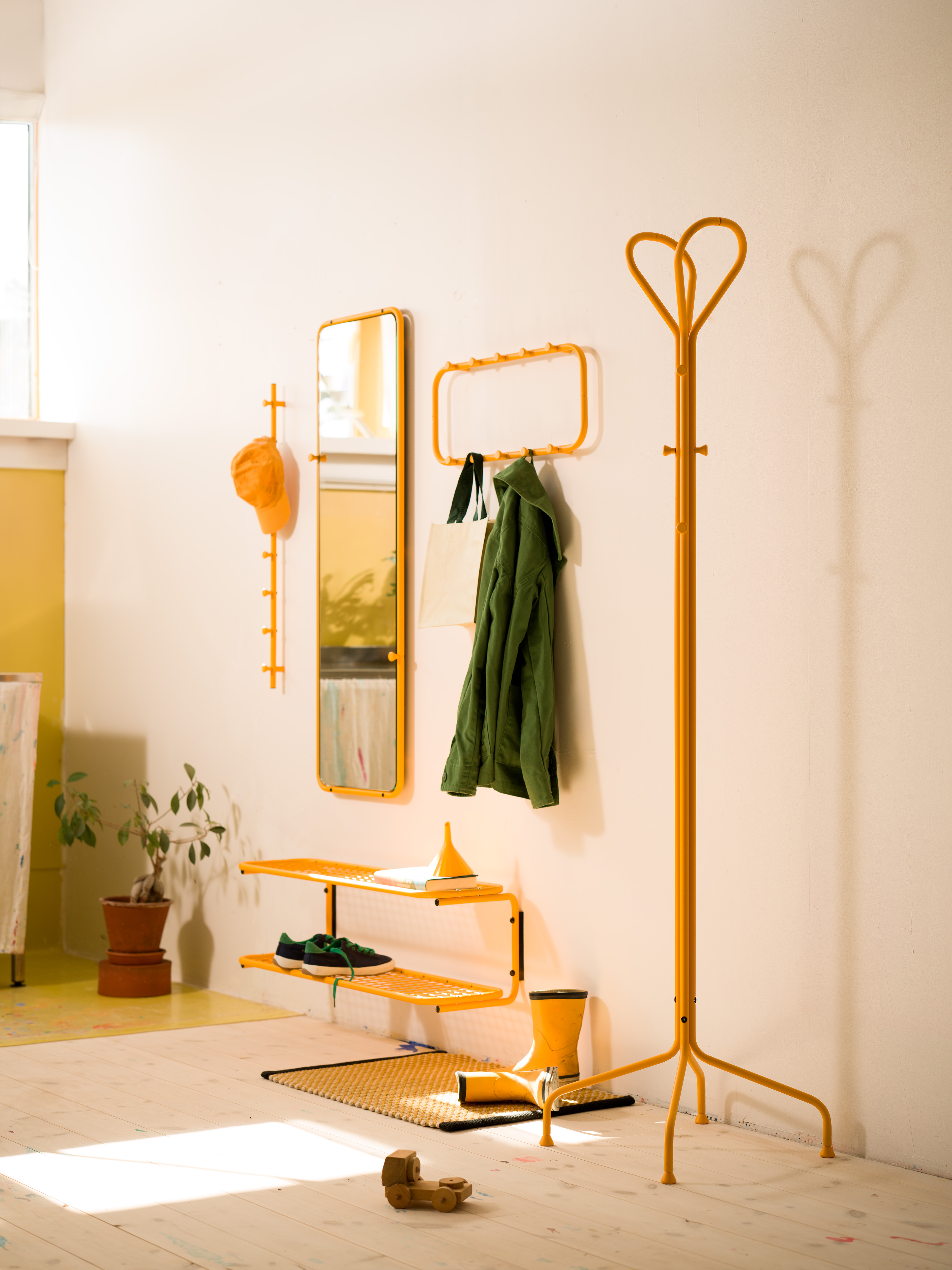 Sun yellow in a bright hallway gives The Classic Family character